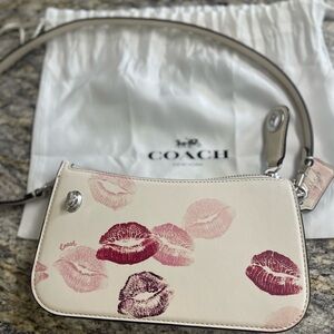 Coach Penn shoulder bag with lip print